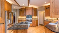 granite-black-kitchen-chestnut-cabinets granite-black-kitchen-chestnut-cabinets